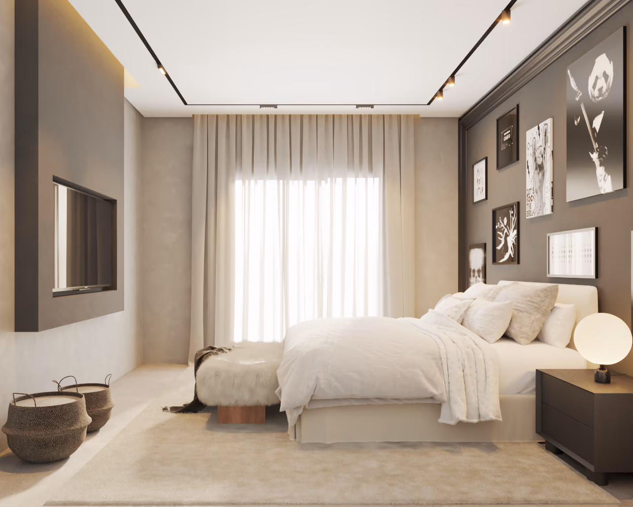 Bedroom with a gallery wall of black and white prints, a white upholstered bed, and linen curtains.