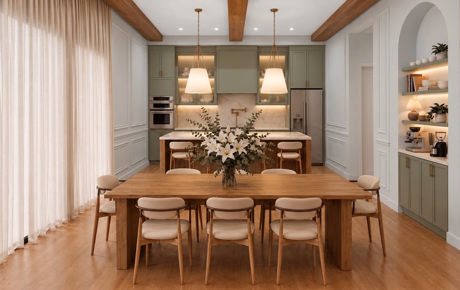 Kitchen and dining area with sage green cabinetry, a wood dining table, upholstered chairs, and two linen pendants under wood beams.