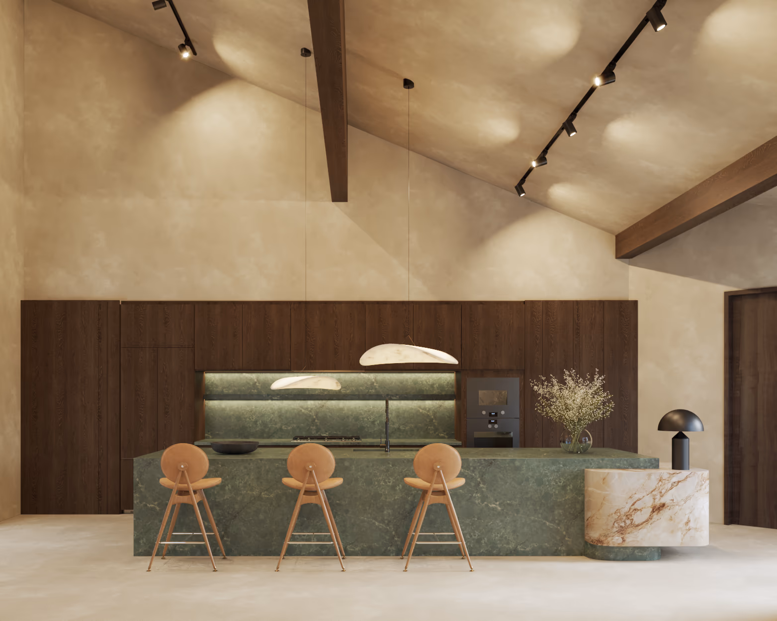 Kitchen with a green stone island, wooden counter stools, and a full-height walnut wall with lit open shelving.