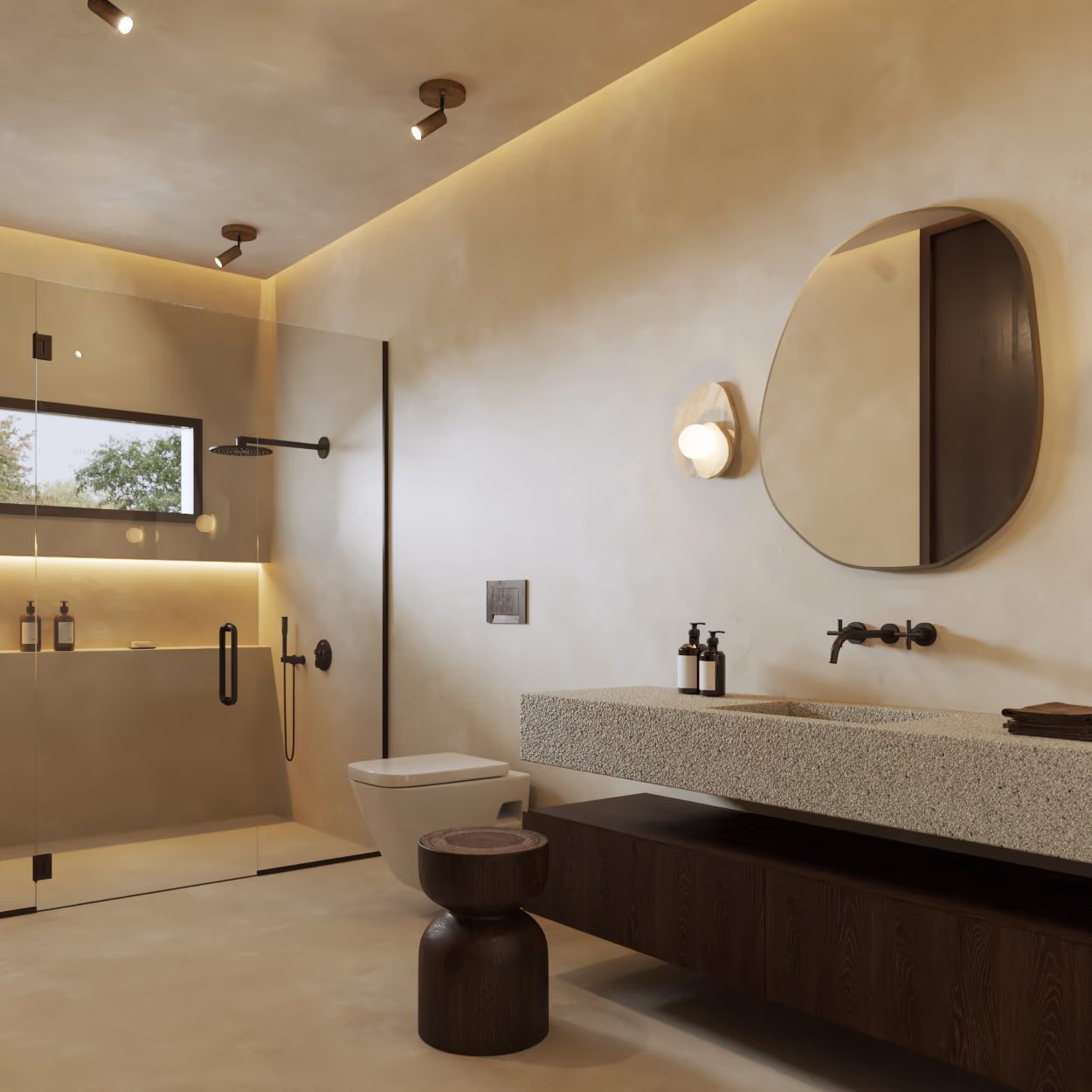 Guest bathroom with a walk-in glass shower, a terrazzo vanity, an organic-shaped mirror, and a sculpted wood stool.