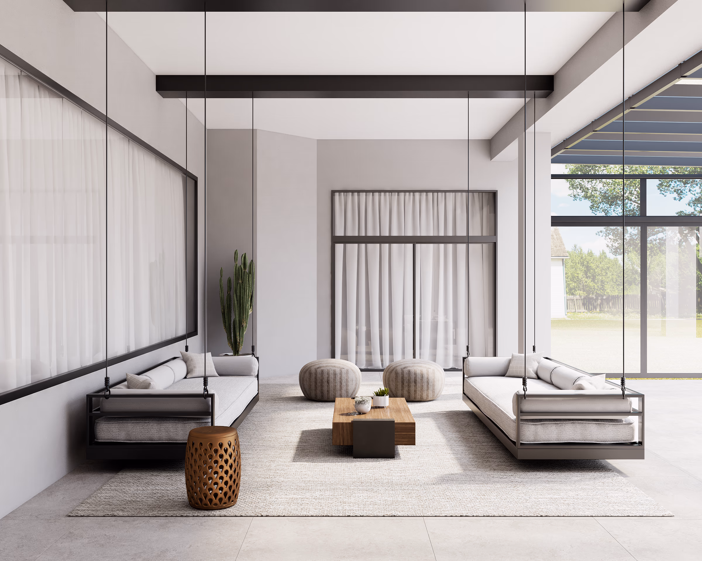 Living room with a coffered ceiling, low lounge sofas, and floor-to-ceiling windows.